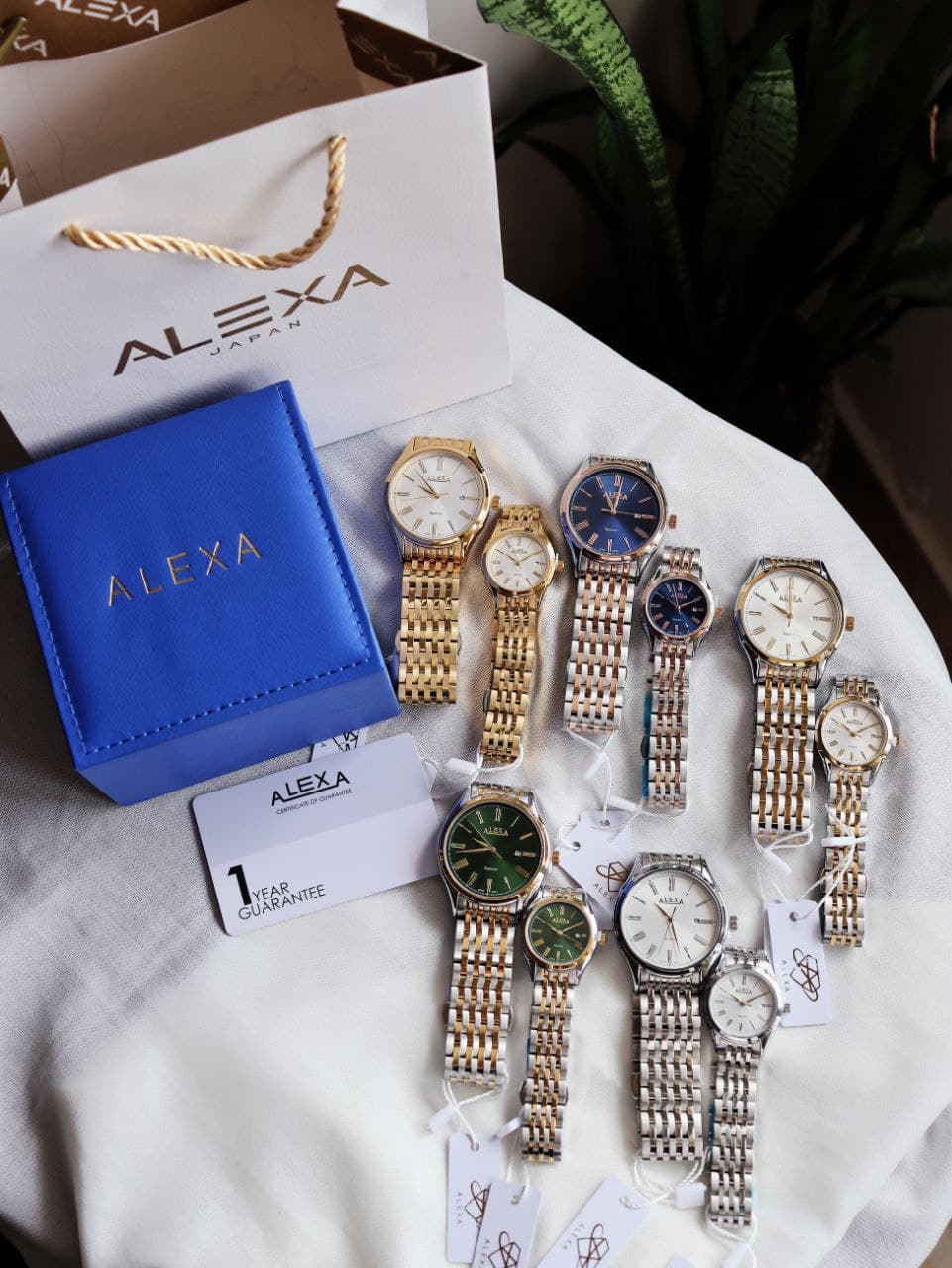 ست ساعت زنانه و مردانه الکسا ALEXA موتور ژاپن ضدآب رنگ ثابت تاریخ دار بند قفلی همراه با جعبه و پاکت اورجینال و یکسال گارانتی کد 2116634 — تصویر ۲