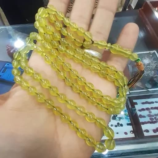 تسبیح شاه مقصود افقان تراش دقیق دانه های بسیار شفاف و یکدست بدون ترک و شکستگی زرد زعفرانی کلکسیونی درحدصادرات | تسبیح سنگی | سنگ طبیعی | تسبیح مذهبی | تسبیح مالاکیت | تسبیح لاجورد | تسبیح
