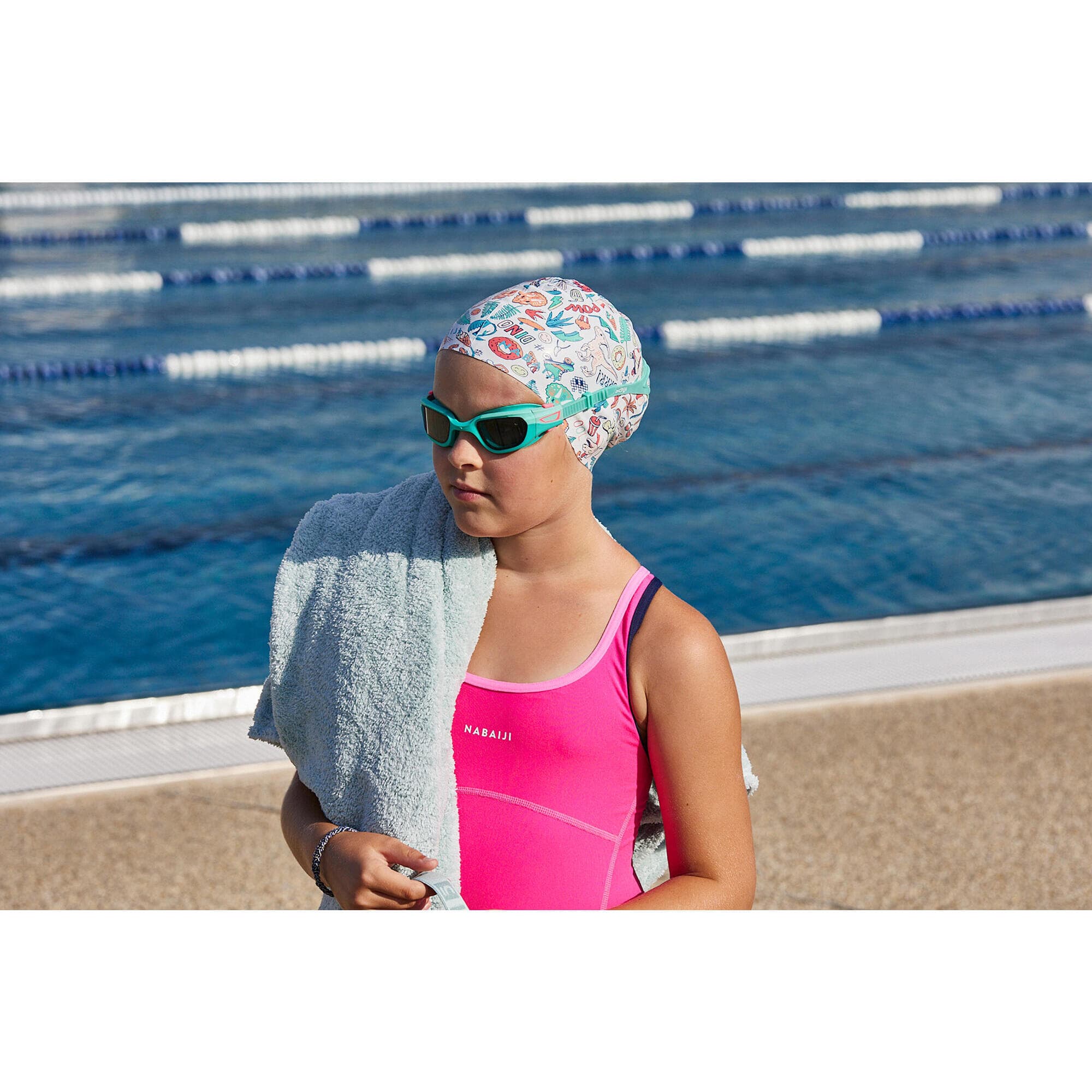 کلاه شنا نابایجی – دکتلون Nabaiji Silicone Swimming Cap – White / Dino Printed – 500 — تصویر ۲