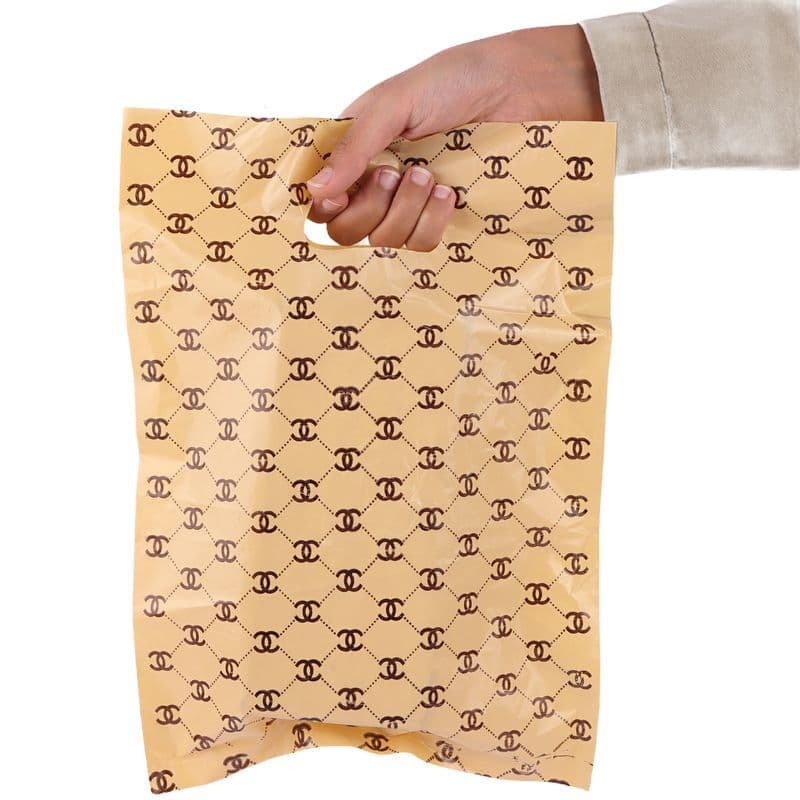 نایلون دسته دار طرح GUCCI سایز 25*35 سانتی متر بسته 1 کیلویی — تصویر ۳