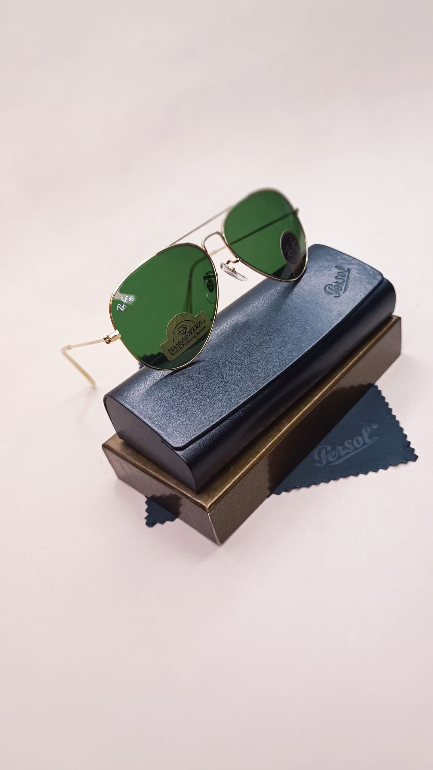 عینک آفتابی اورجینال Ray ban فریم فلزی برنزی UV 400 — تصویر ۳