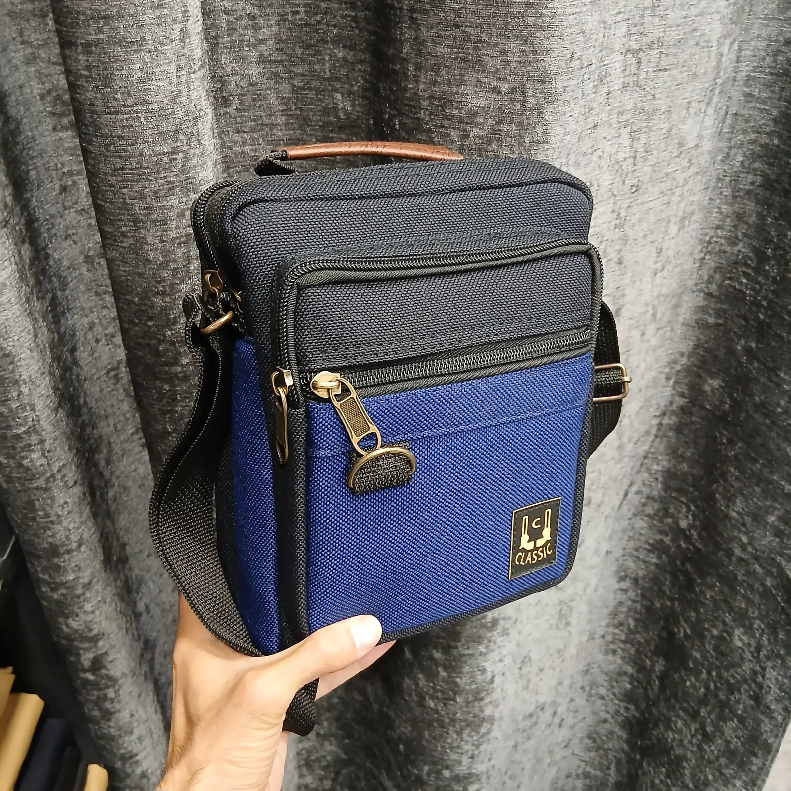 کیف دوشی اسپرت مردانه چرم مصنوعی دو طبله ابعاد 24x18x7 سانتیمتر — تصویر ۷