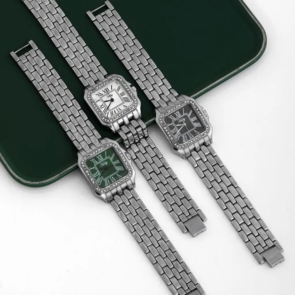 ساعت مچی زنانه نقره ای کلاسیک قفل کتابی رنگ صفحه مشکی و سبز و سفید کد zmp 586379