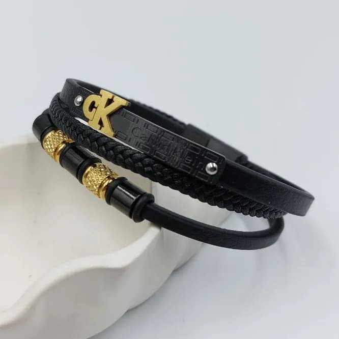دستبند چرمی مردانه ck کلوین کلاسیک قفل استیل طلایی رنگ ثابت کد zmp 9583130