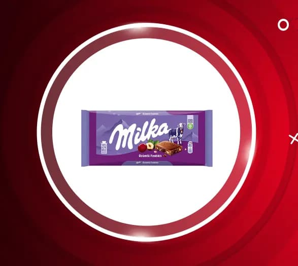شکلات شیری با تکه های فندق و کشمش میلکا Milka — تصویر ۲