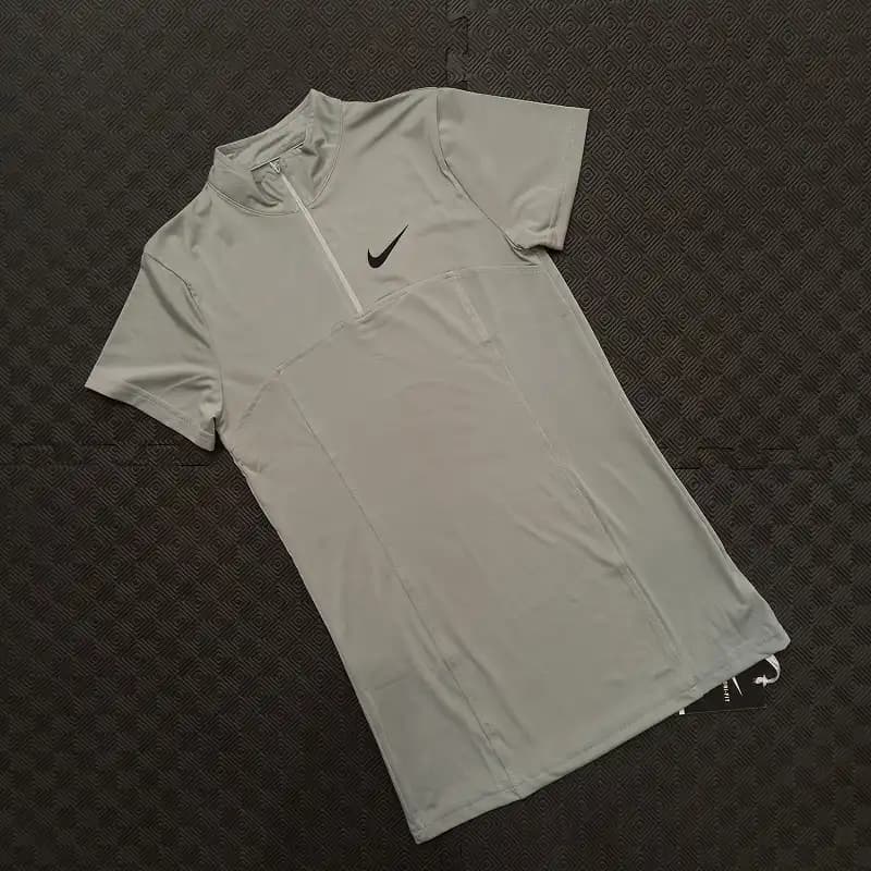 تیشرت ورزشی زنانه نیم زیپ نایک TS101 — تصویر ۸