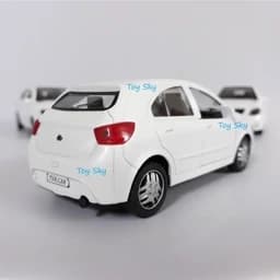 اسباب بازی - ماکت ماشین - تیبا 2 (هاچ بک) - (Hatchback) Tiba 2 - فلزی - عقبکش - دربهای جلو بازشو - رنگ سفید — تصویر ۶