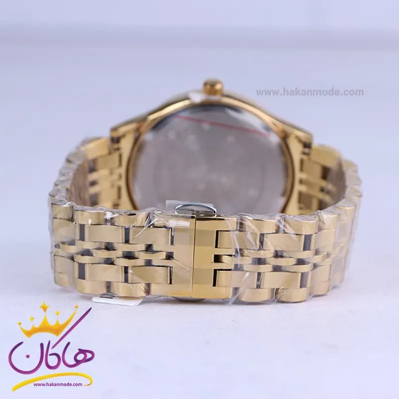 ساعت مچی سیکو فلزی طلایی صفحه مشکی مردانه OS 9/39 — تصویر ۳