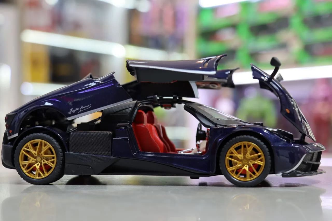 ماشین فلزی پاگانی Huayra دودزا آبی — تصویر ۶