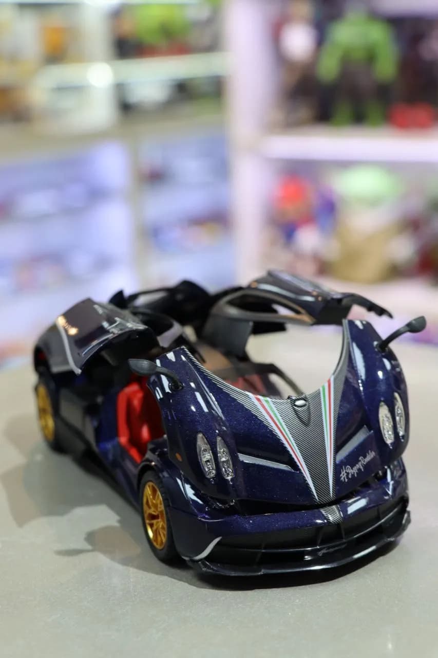 ماشین فلزی پاگانی Huayra دودزا آبی — تصویر ۷