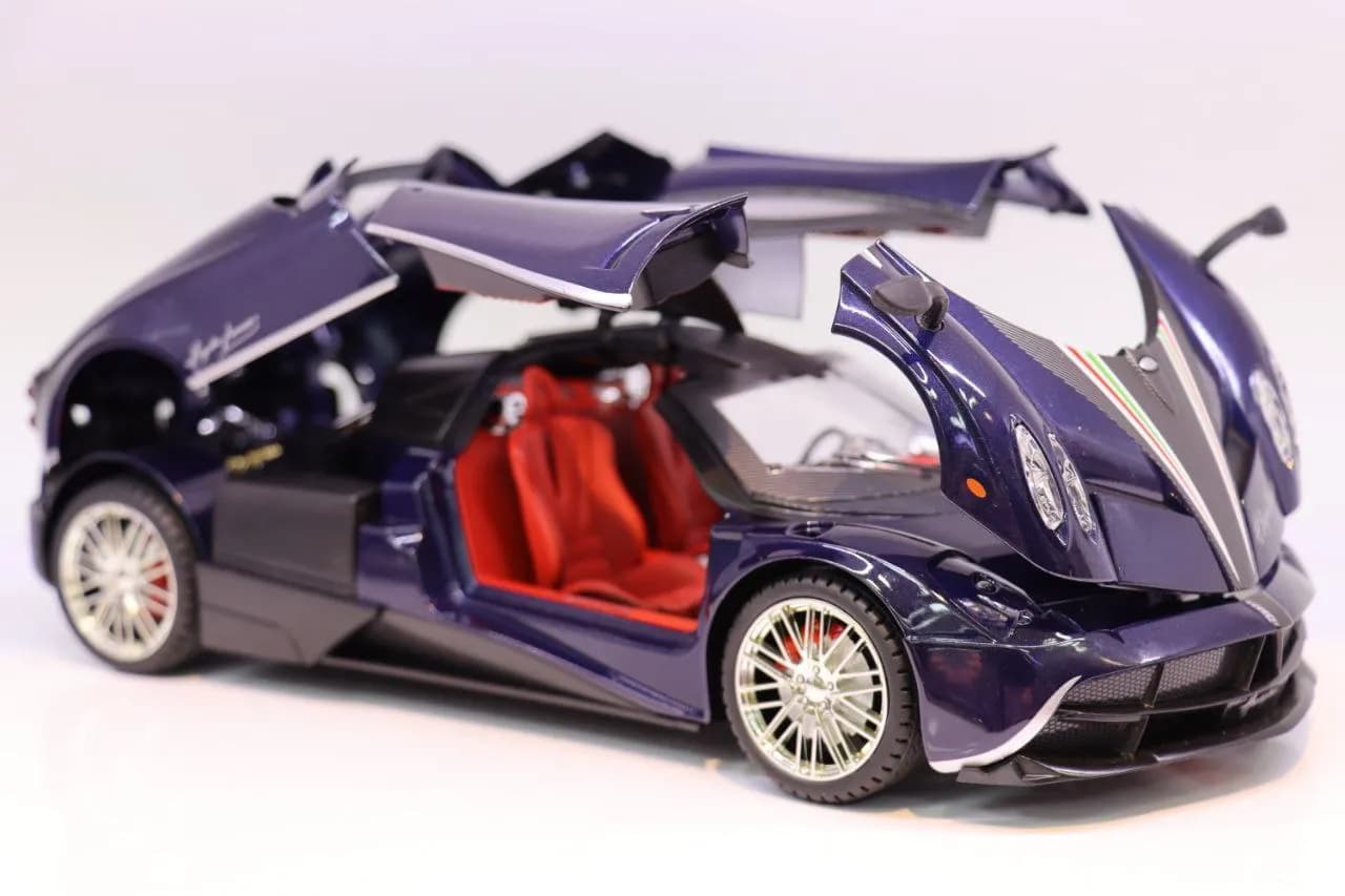 ماشین فلزی پاگانی Huayra آبی — تصویر ۲