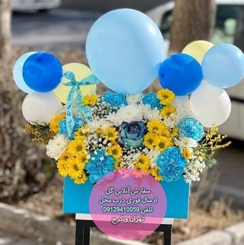 دسته گل و کیک تولد برای تولد نوزاد با طرح مینیمال