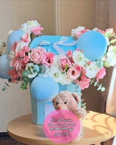 دسته گل و کیک برای زایمان طبیعی با کمک همسر