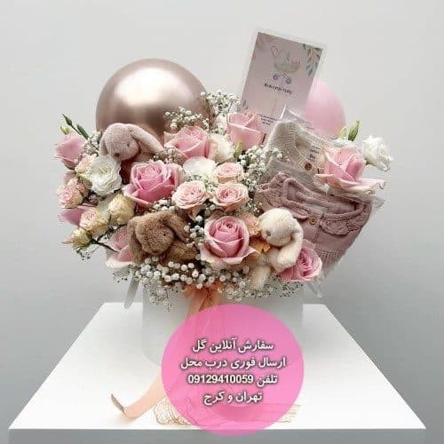 باکس گل و عروسک برای خوش‌آمدن نوزاد