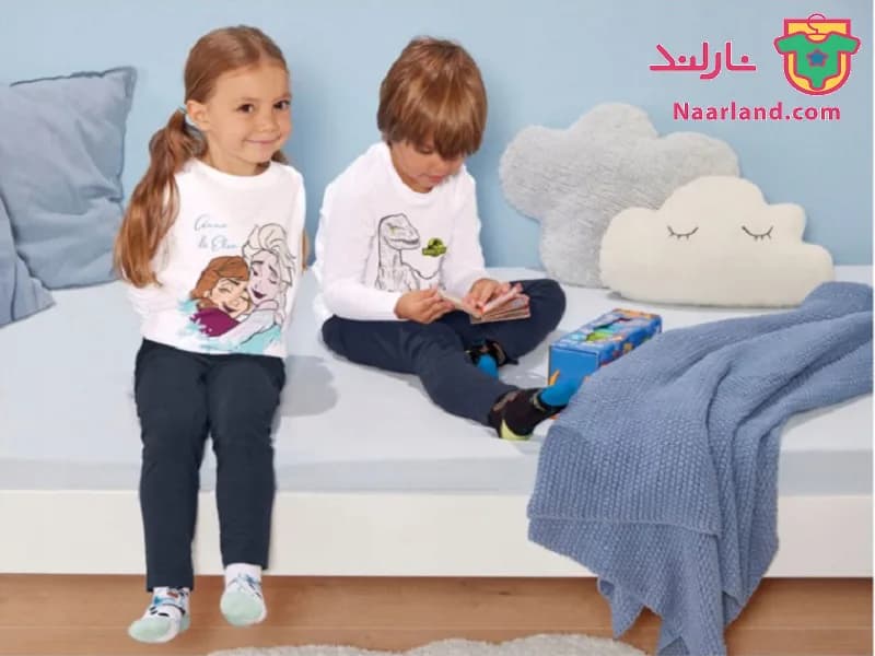 ست بلوز شلوار دخترانه کودک frozen طرح آنا و السا — تصویر ۲