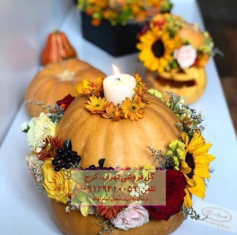 گل و میوه یلدا با گل رز و نارنگی در گلفروشی کاشانک