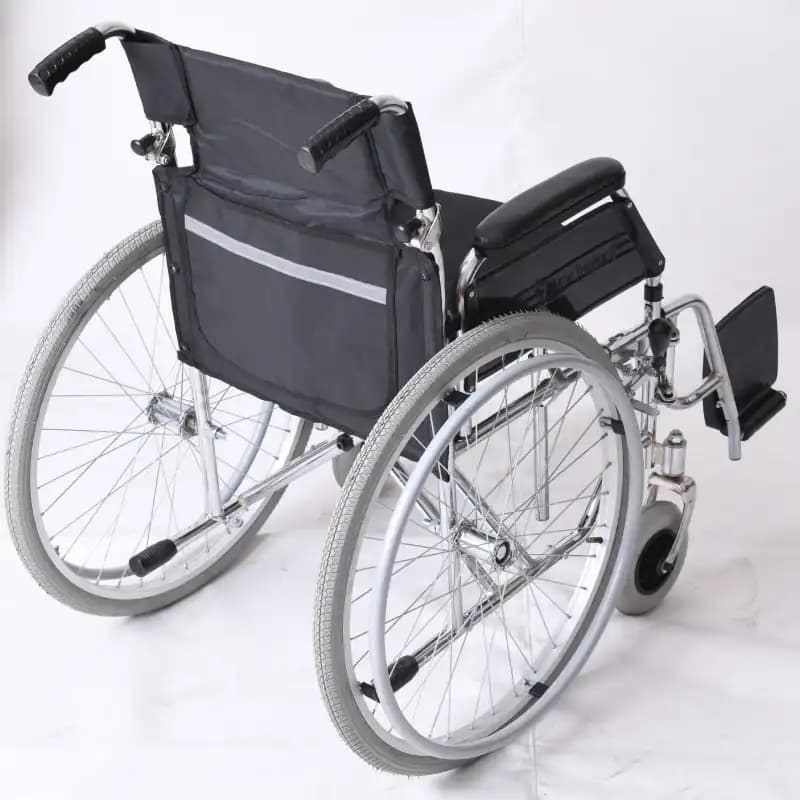 ویلچر ارتوپدی مدل 701DS آبکرم سایز 43 ضربدری دوبل دسته شکن چرخ عقب بادی چرخ جلو توپر ایران بهکار — تصویر ۲