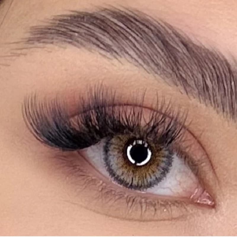 لنز رنگی چشم نیو ویژن پرو رنگ طوسی عسلی روشن بدون دور (NEW VISION-PRO) مدل آمبرگری3 (Amber Gray3) (بسته 12 عددی) — تصویر ۲