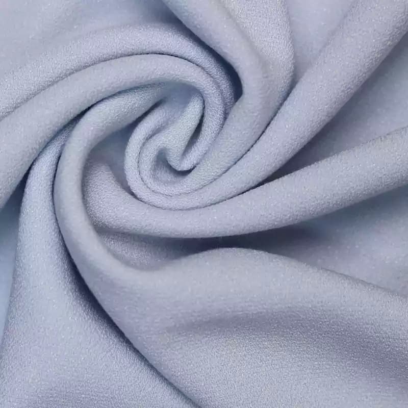 پارچه کرپ لمه آبی آسمانی وارداتی — تصویر ۳