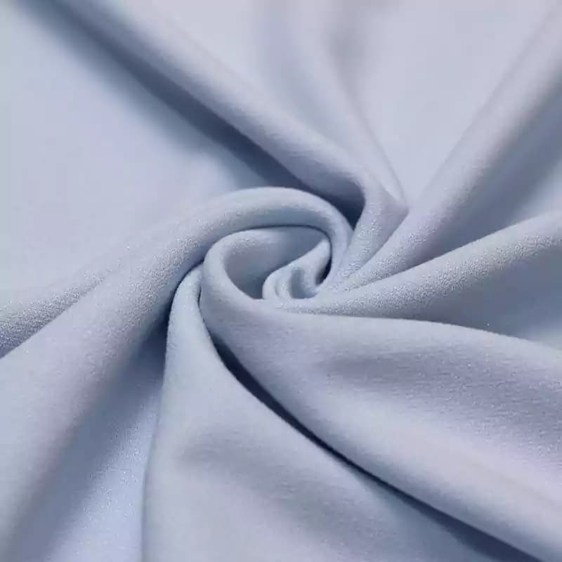 پارچه کرپ لمه آبی آسمانی وارداتی — تصویر ۲