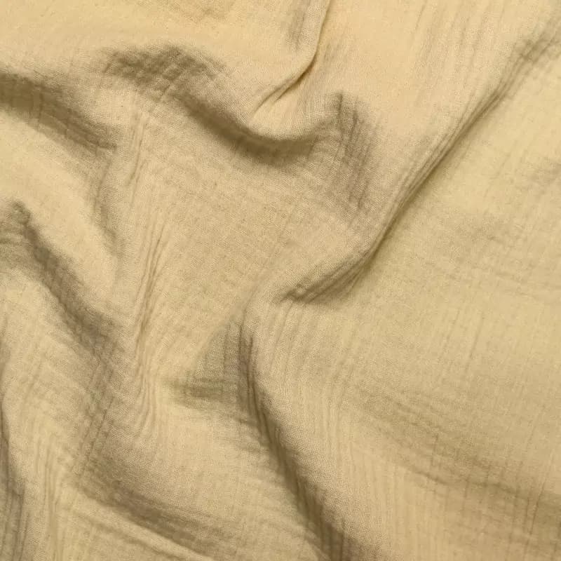 پارچه وال موسلین ساده کرم وارداتی — تصویر ۲