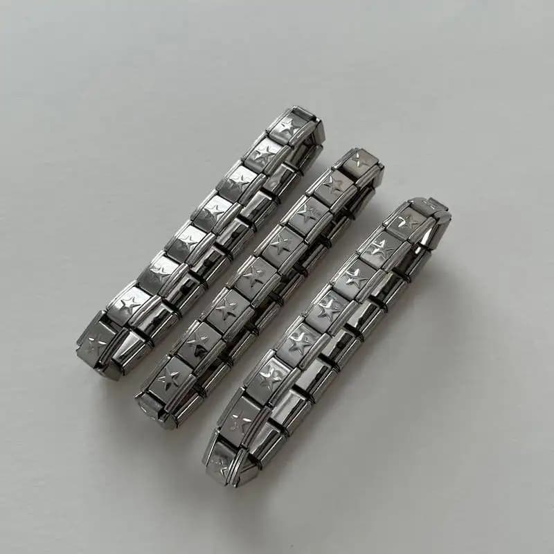 دستبند چارم یونیسکس (مردانه و زنانه) ستاره ای رنگ نقره ای استیل عیار 316 ضد حساسیت و رنگ ثابت کد zsf — تصویر ۳