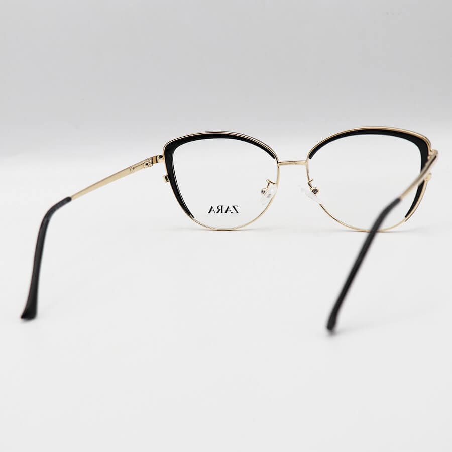 عینک طبی زنانه ZARA با فریم چشم گربهای، رنگ طلایی و مشکی و دسته فنردار مدل TR3013 — تصویر ۳
