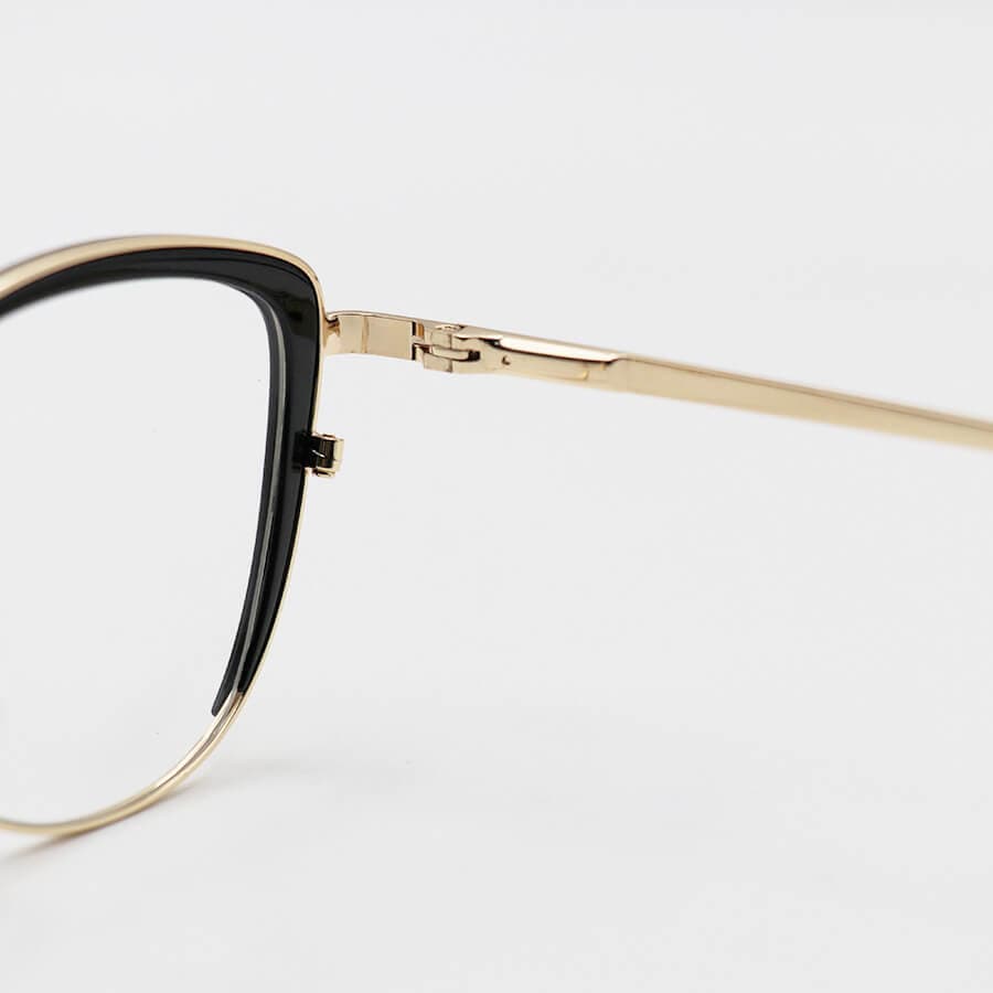 عینک طبی زنانه ZARA با فریم چشم گربهای، رنگ طلایی و مشکی و دسته فنردار مدل TR3013 — تصویر ۴