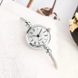ساعت مچی عقربه ای زنانه مدل فنری النگویی کد 1 — تصویر ۲