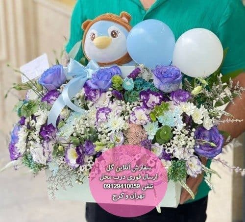 دسته گل و کیک تولد برای تولد نوزاد در باغ