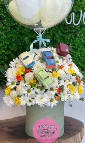 دسته گل و کیک برای حضور همسر در زایمان طبیعی در خانه