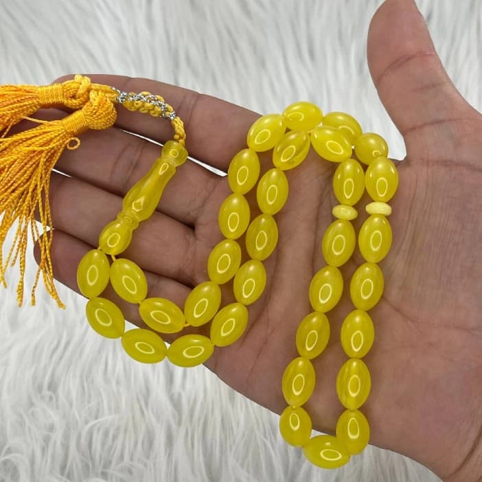 تسبیح پودر کهربا 33 دانه زرد کد TA6 — تصویر ۲