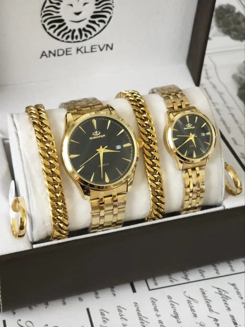 ست ساعت زنانه و مردانه الگانس (بند طلایی صفحه مشکی) کد 4752