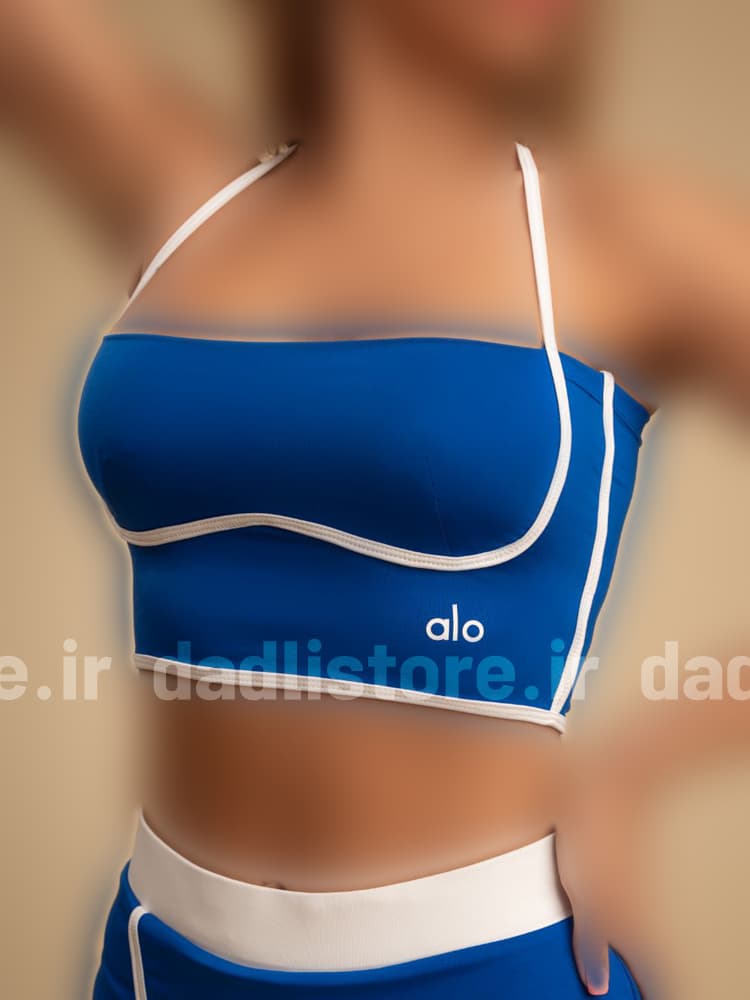 ست ورزشی زنانه فلامنت نیمتنه کاپدار و دامن لاینر alo — تصویر ۴