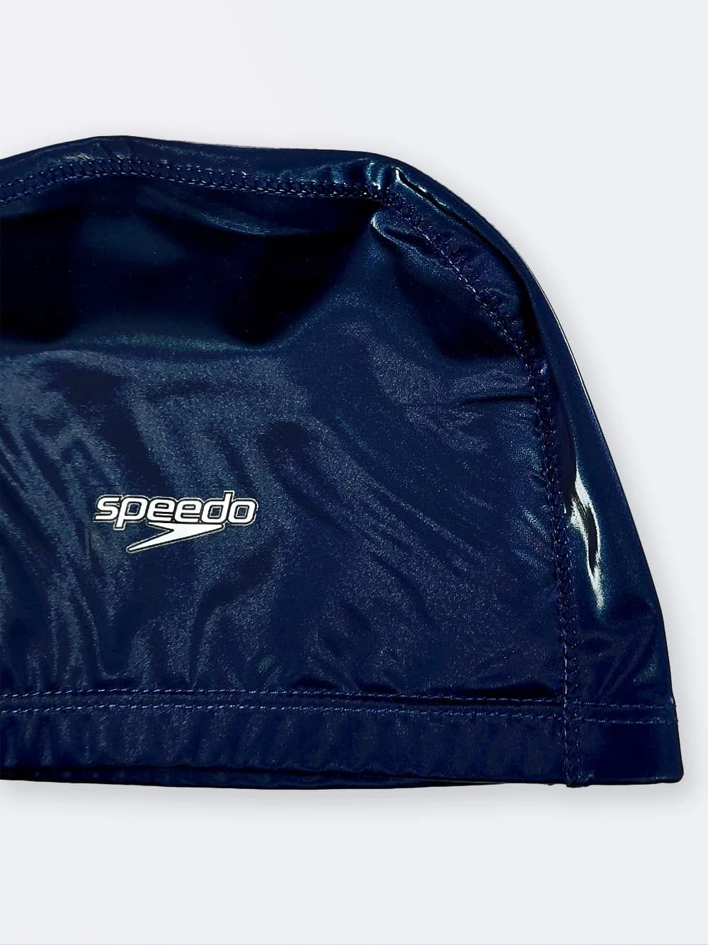 کلاه استخر ضد کلر زنانه و مردانه سرمه ای رنگ اسپیدو ( Speedo ) با جنس فومی — تصویر ۴