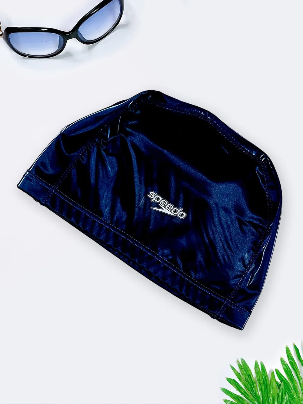 کلاه استخر ضد کلر زنانه و مردانه سرمه ای رنگ اسپیدو ( Speedo ) با جنس فومی