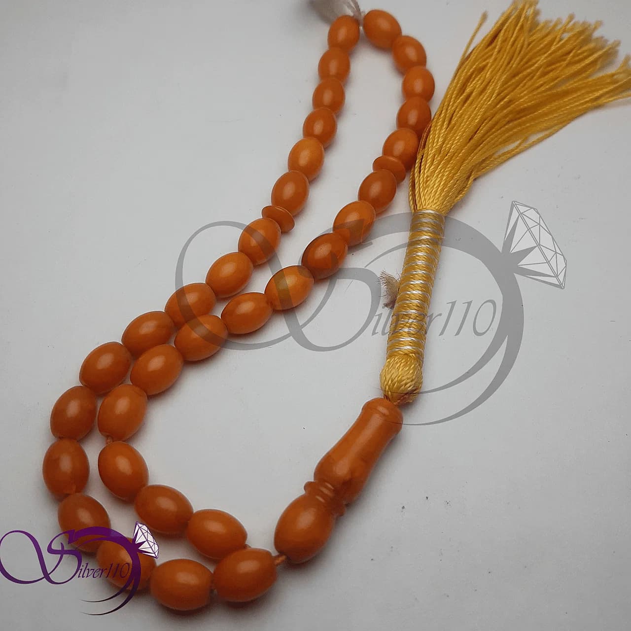 تسبیح کهربا نارنجی کد 42502