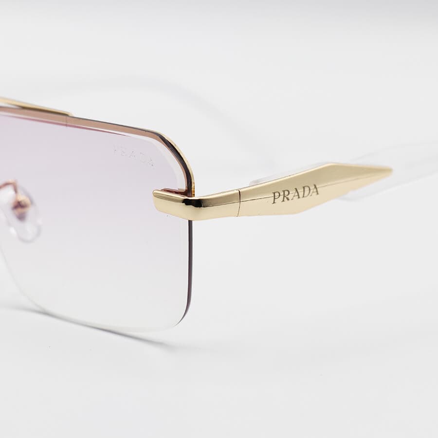 عینک شب PRADA مستطیلی با فریم مخفی، رنگ طلایی، دسته شفاف و لنز بی رنگ مدل WH4054 — تصویر ۶