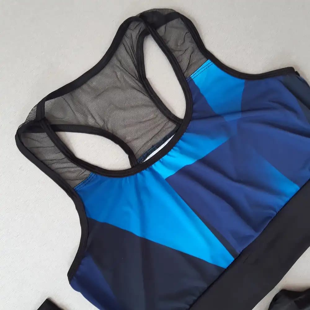 ست نیم تنه و لگ ورزشی Under Armour — تصویر ۲