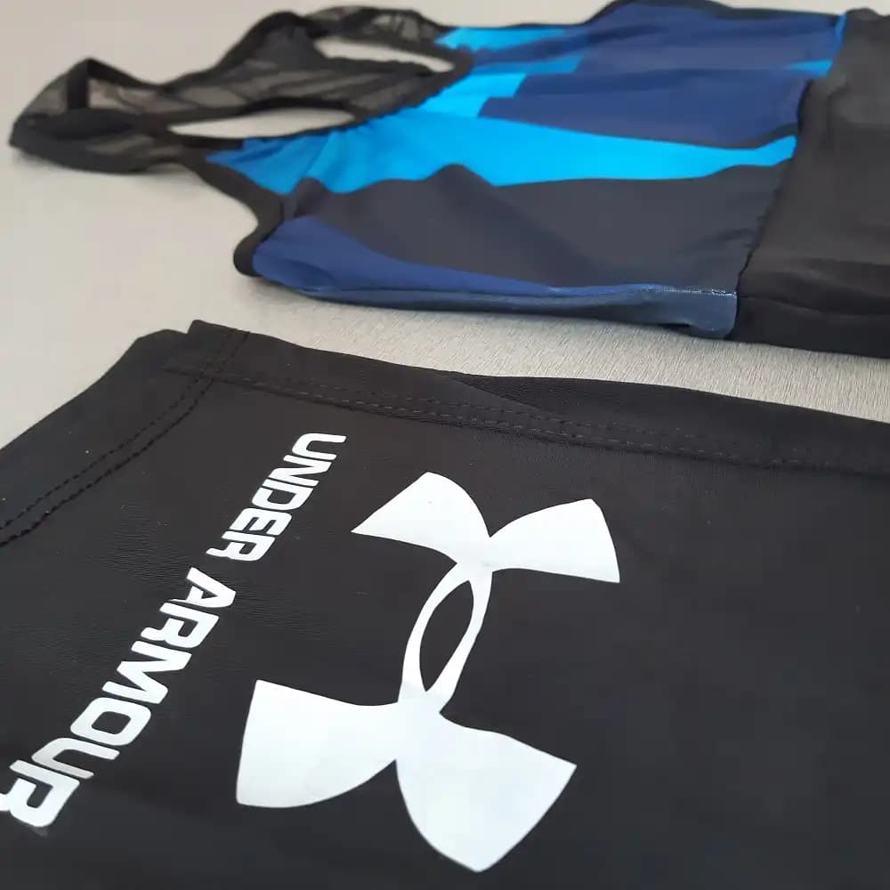 ست نیم تنه و لگ ورزشی Under Armour — تصویر ۴
