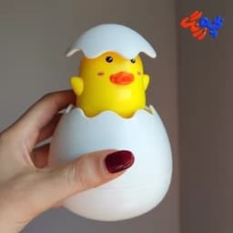 اسباب بازی آبریز حمام کودک وارداتی مدل جوجه تخم مرغی سایز 15 سانت — تصویر ۲