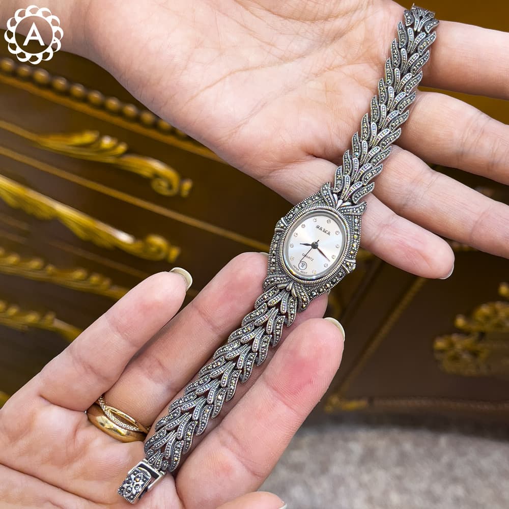 ساعت مچی زنانه نقره طرح بیضی سیاه قلم مدل Sama 1233PR