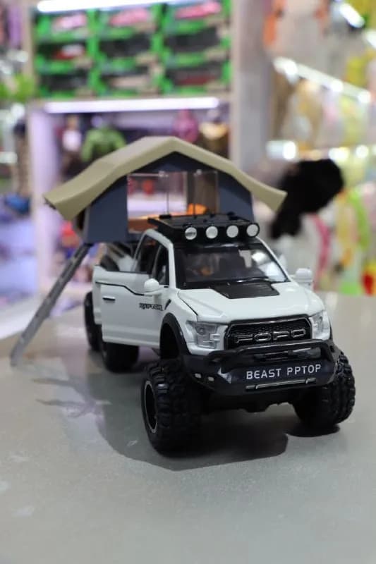ماشین فلزی فورد F150 رپتور کمپر سفید — تصویر ۸