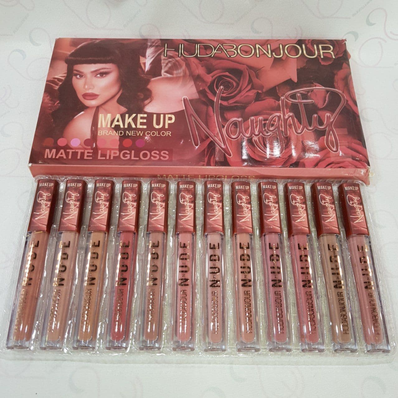 پک رژ لب مایع هدی بیوتی HudaBeauty مدل ناوتی naughty مجموعه 12 عددی