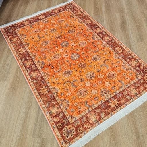 فرشینه | فرش چاپی برند حسن نیا چاپی هازان ترک طرح سنتی نارنجی (پس کرایه)