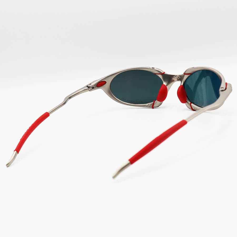 عینک آفتابی پلاریزه OAKLEY با فریم فلزی، عدسی آینه ای و قرمز رنگ به همراه پک اصلی مدل 1622 — تصویر ۴