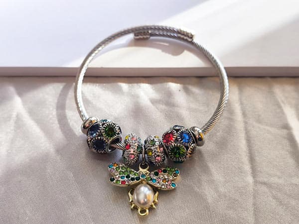 دستبند پاندورا پروانه کریستال رنگی — تصویر ۲