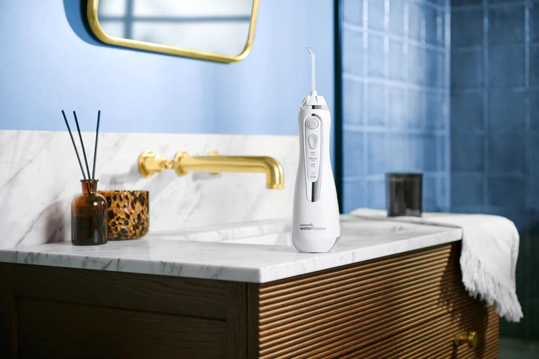 واتر جت شارژی بی سیم واتر پیکwaterpik water flosser سفید رنگ (امریکا) اورجینال — تصویر ۳