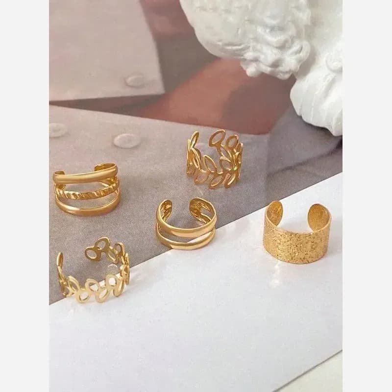 پک گوشواره دخترانه برنجی مدل ایرکاف چندتکه رنگ طلایی و نقره ای — تصویر ۴