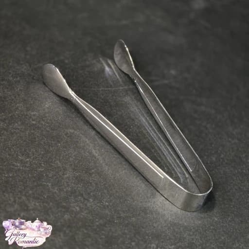 انبر-گیره شیرینی استیل hm(پس کرایه) — تصویر ۳
